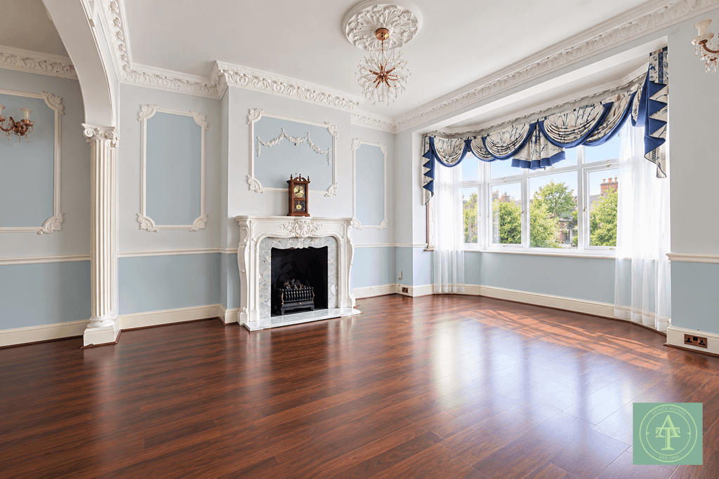 Property photo 2 of 22 Elegant Victorian Living Room With Bay Windows