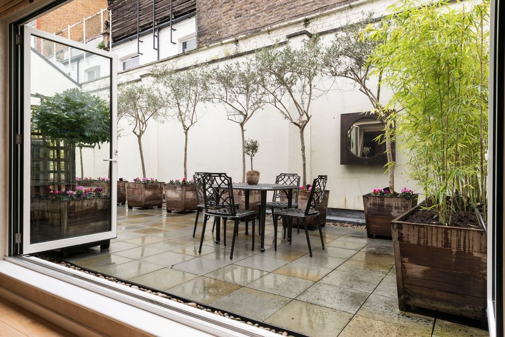 Property photo 3 of 12 Patio Garden