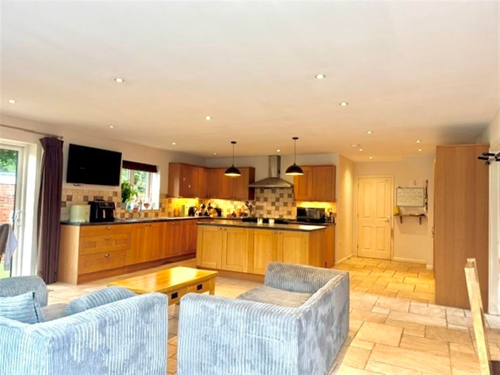 Property photo 3 of 15 Kitchen/Dining/Family Room 2