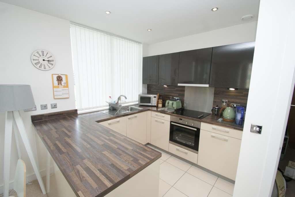 Property photo 3 of 6 Kitchen