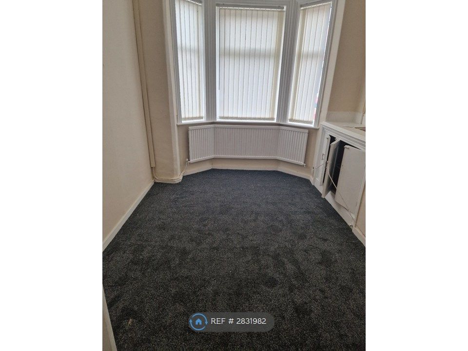 Property photo 2 of 12 Front Living Room