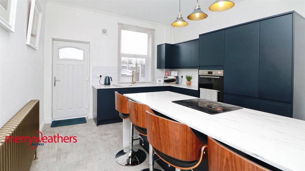 Property photo 3 of 12 Dining Kitchen