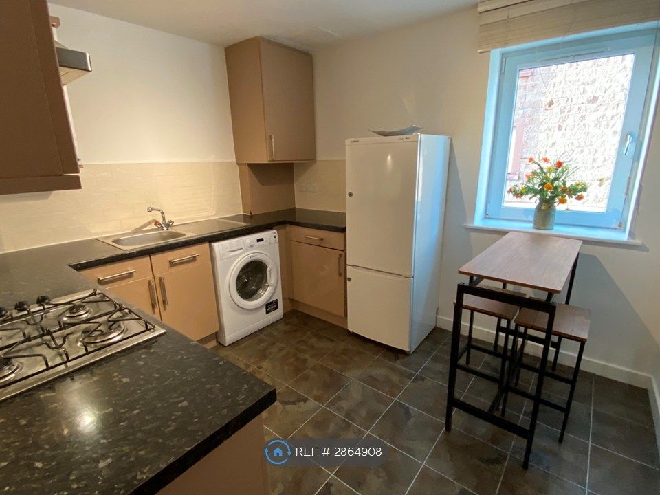 Property photo 2 of 28 Dining Kitchen
