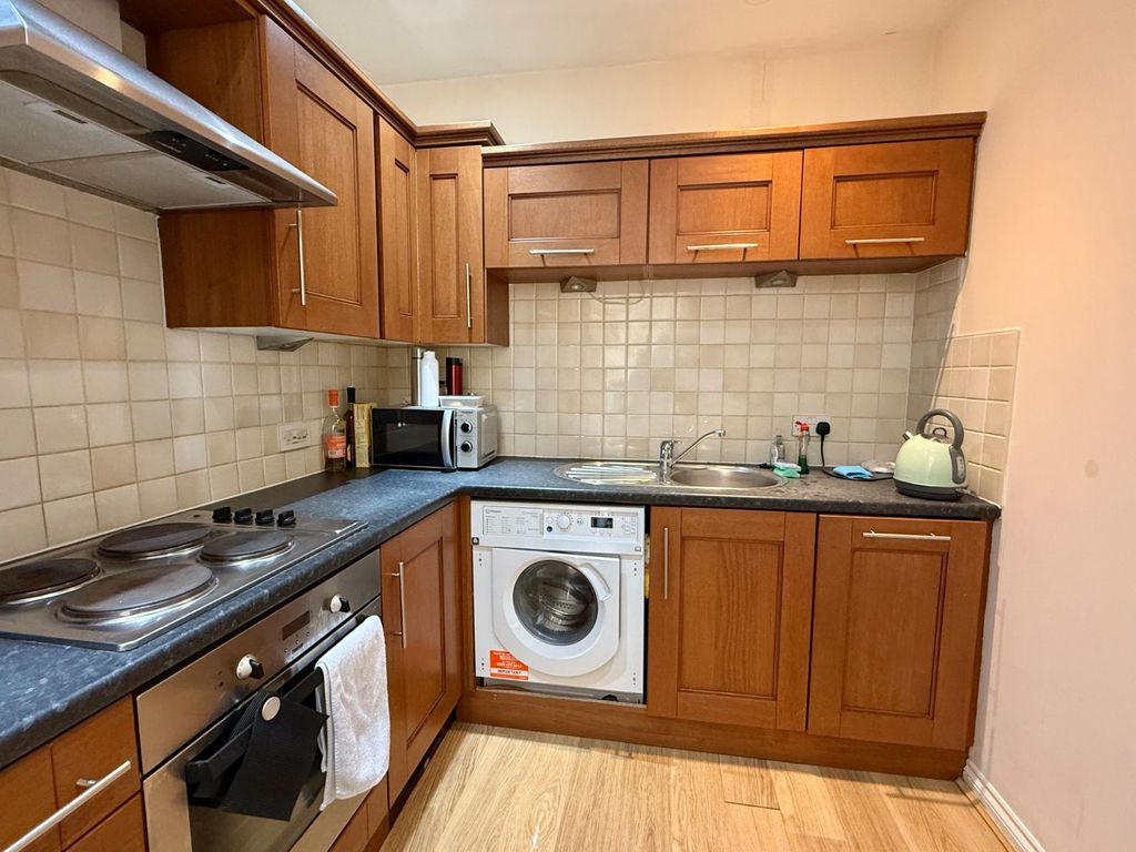 Property photo 2 of 8 Kitchen