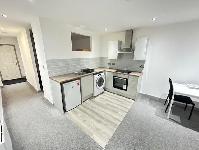 Property photo 3 of 8 Kitchen