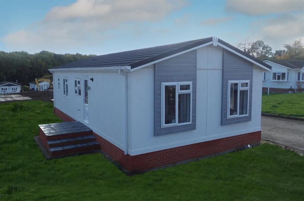 Property photo 2 of 9 New Side Elevation