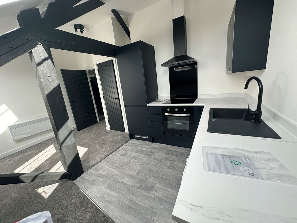 Property photo 3 of 6 Kitchen