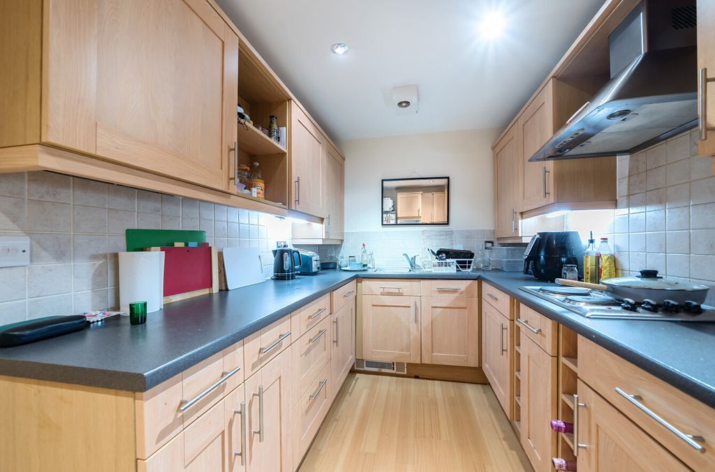 Property photo 3 of 12 Kitchen