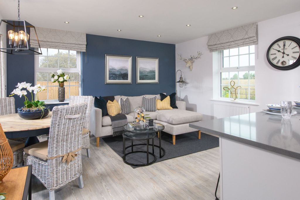 Property photo 2 of 10 Kitchen And Family Area In The Moreton Show Home