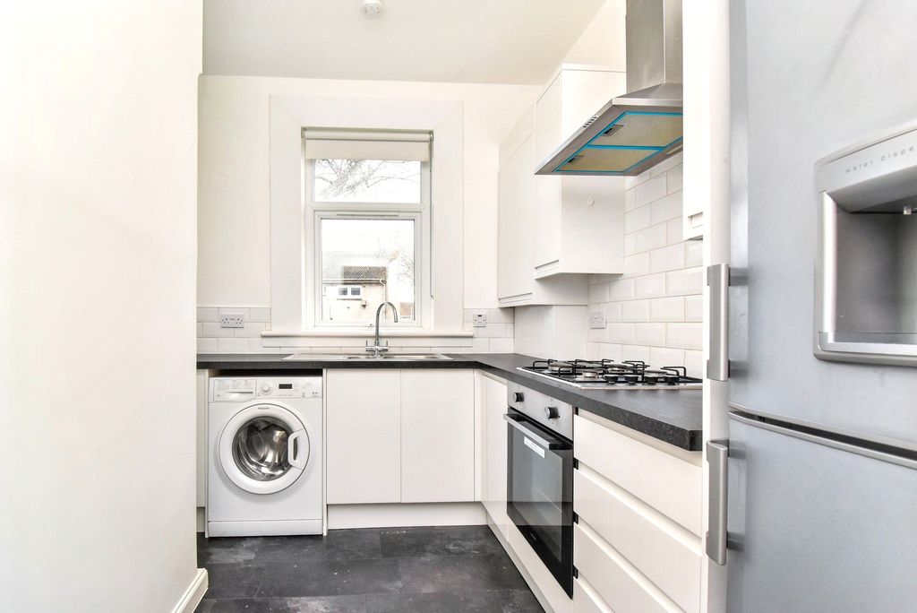 Property photo 3 of 7 Kitchen Angle 1