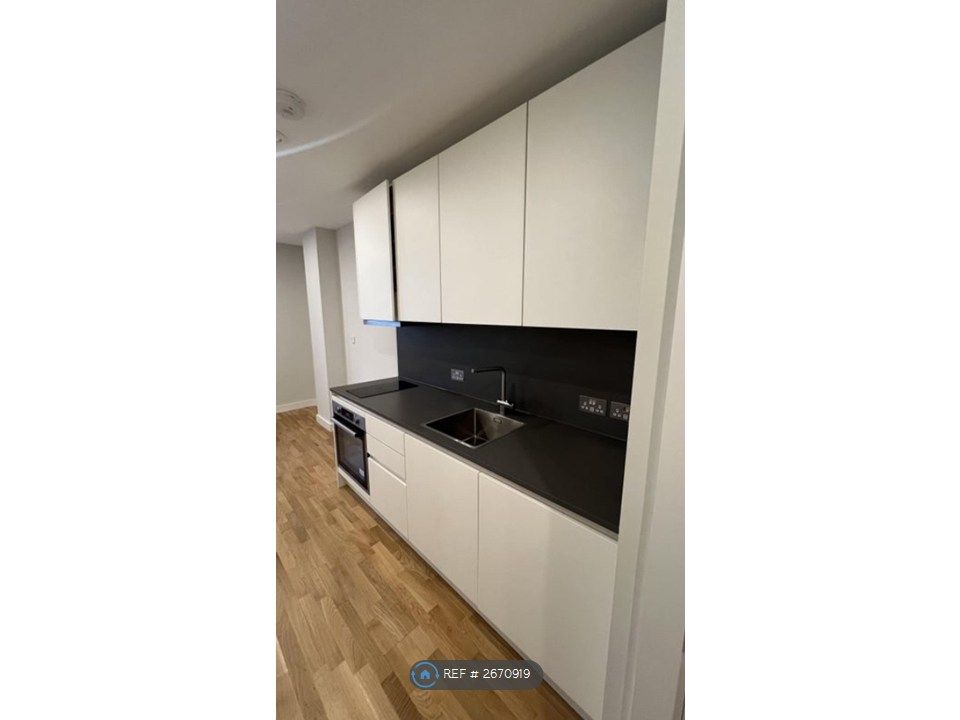 Property photo 2 of 12 Kitchen Area