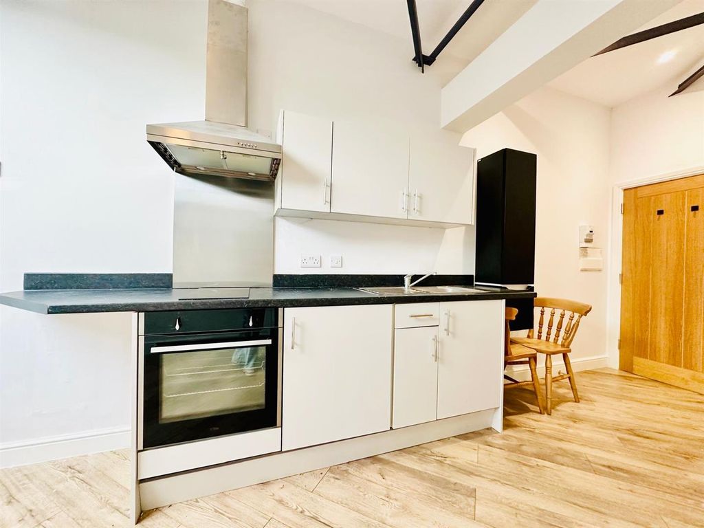 Property photo 2 of 6 Kitchen Area