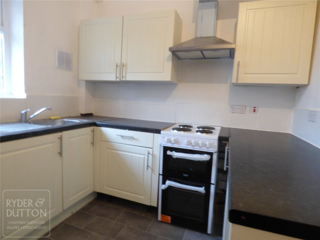 Property photo 3 of 12 Kitchen