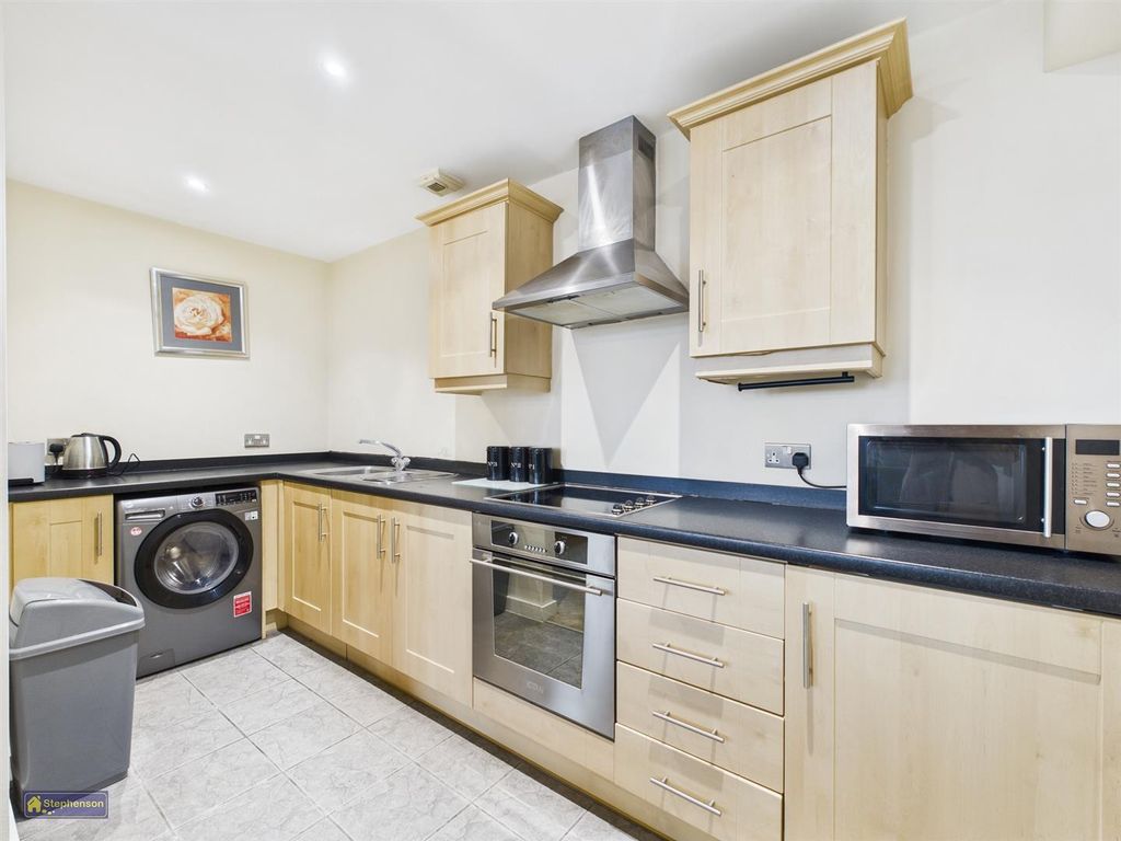 Property photo 3 of 8 Kitchen Area