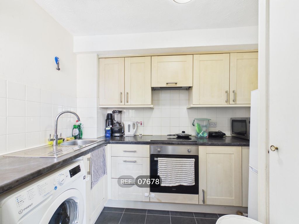 Property photo 2 of 12 Kitchen