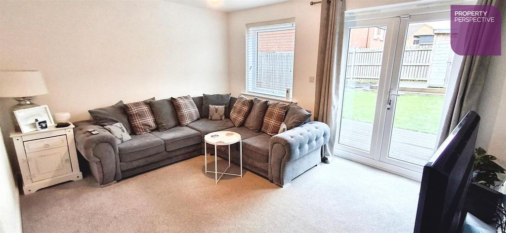 Property photo 3 of 12 Living Room