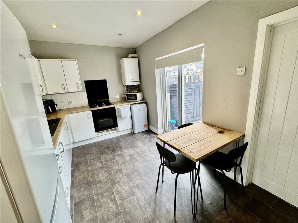 Property photo 3 of 8 Dining Kitchen