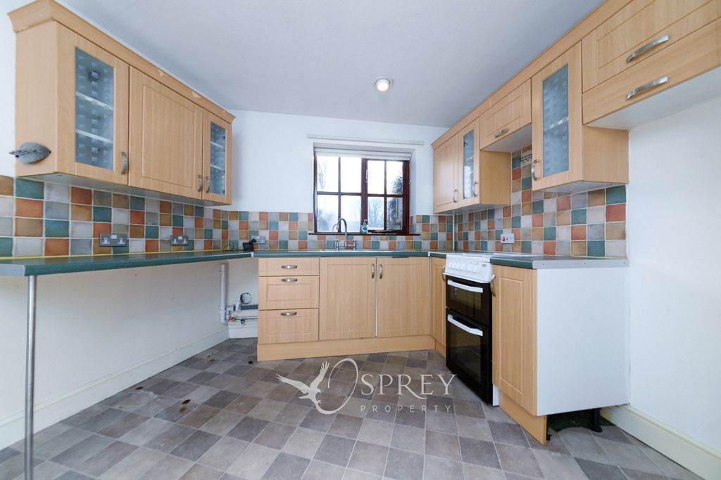 Property photo 2 of 9 Kitchen