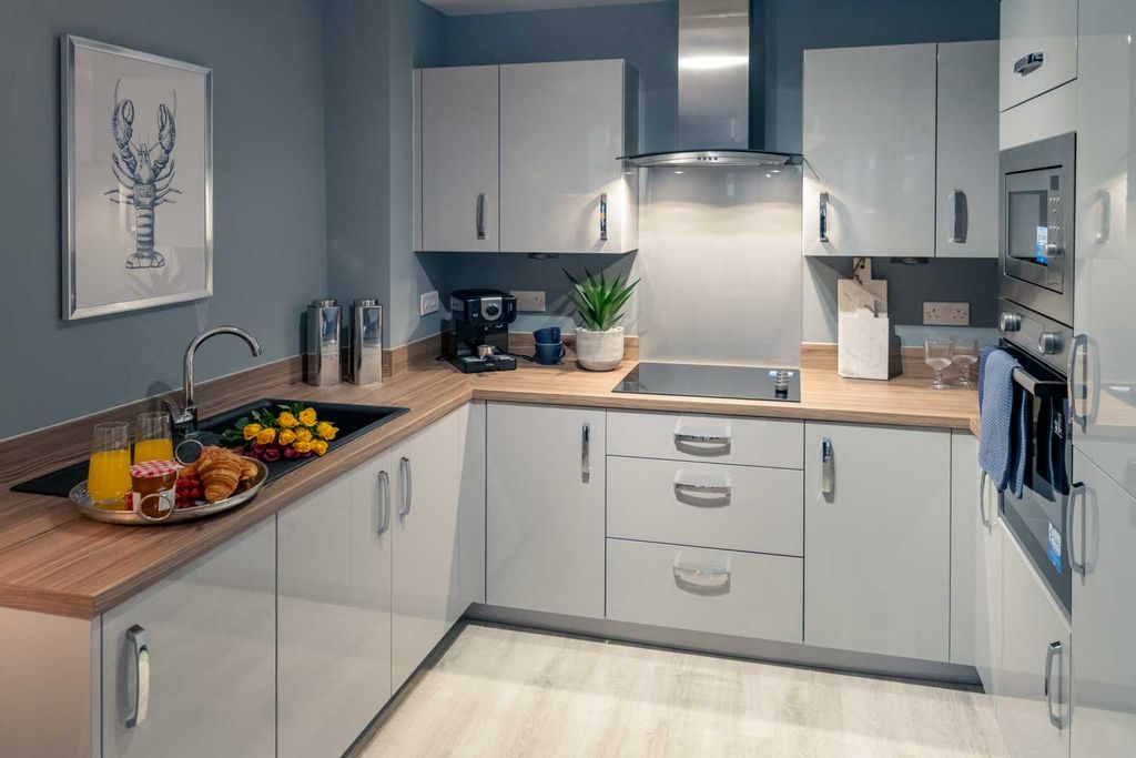 Property photo 2 of 10 Typical Kitchen