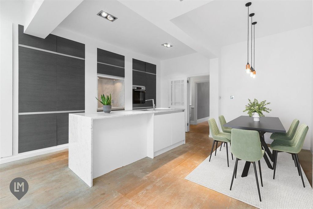 Property photo 3 of 10 Kitchen/Dining/Living Room