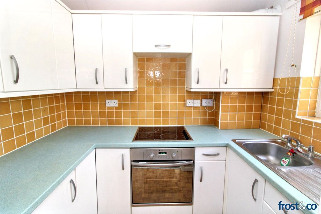 Property photo 3 of 12 Kitchen