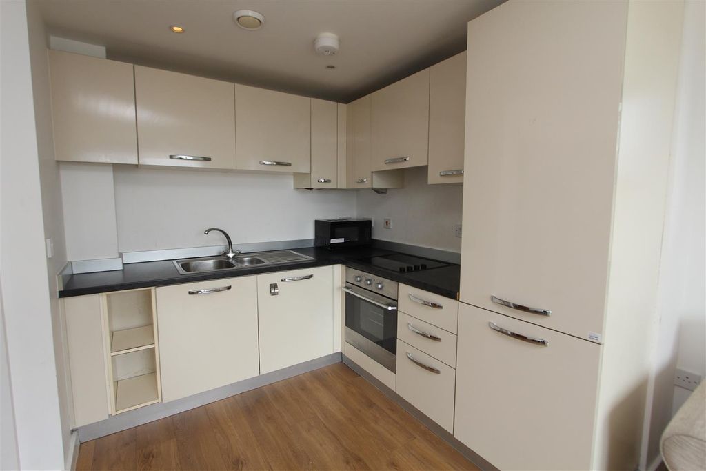 Property photo 3 of 10 Modern Fitted Kitchen With Ample Storage Space...