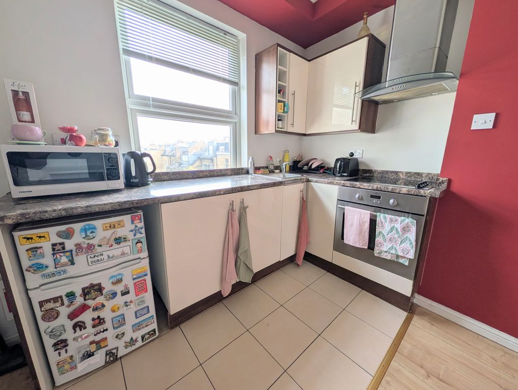 Property photo 3 of 8 Open-Plan Kitchen