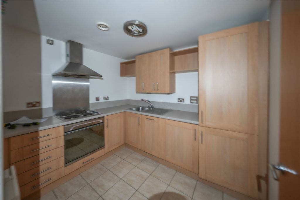 Property photo 3 of 12 Kitchen