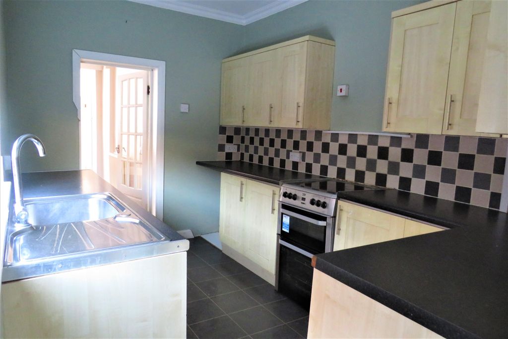 Property photo 3 of 13 Kitchen