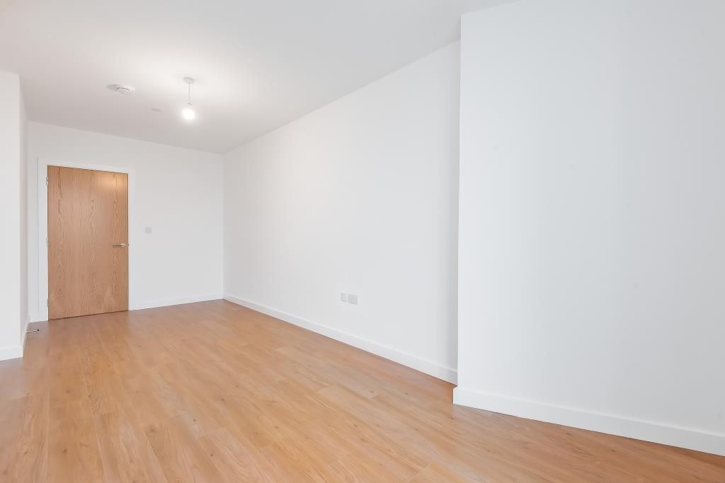 Property photo 3 of 12 Living Area