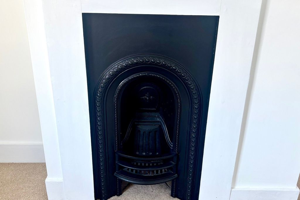 Property photo 3 of 11 Fireplace