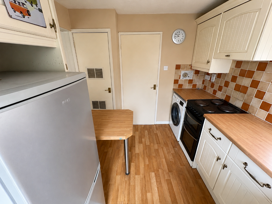 Property photo 3 of 13 Kitchen
