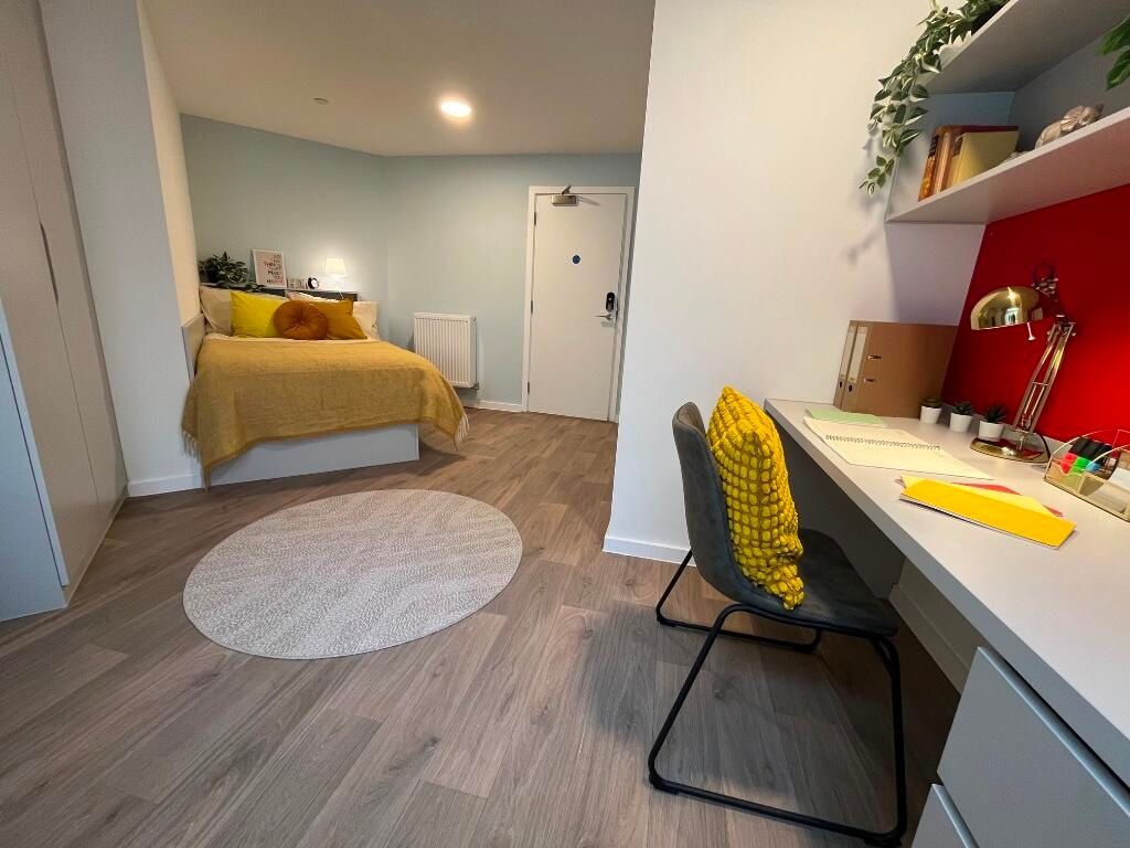 Property photo 1 of 14 A Modern Master Bedroom Featuring A Comfortable Do...