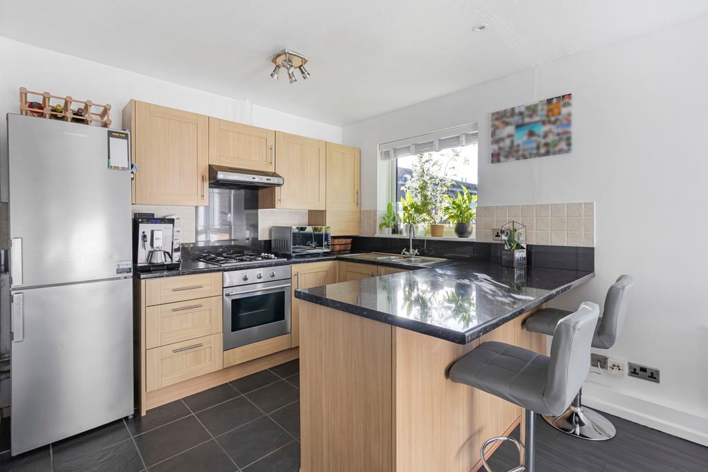 Property photo 3 of 16 Kitchen