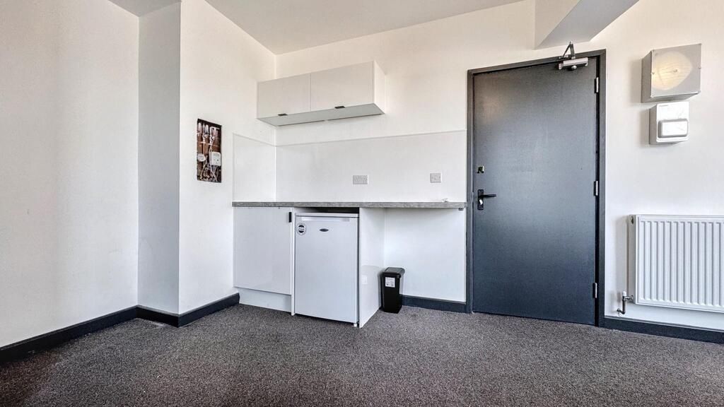 Property photo 2 of 4 Compact Studio Kitchenette With Clean White Units,...