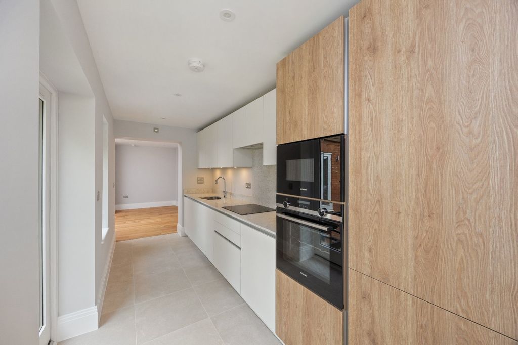 Property photo 3 of 13 Kitchen