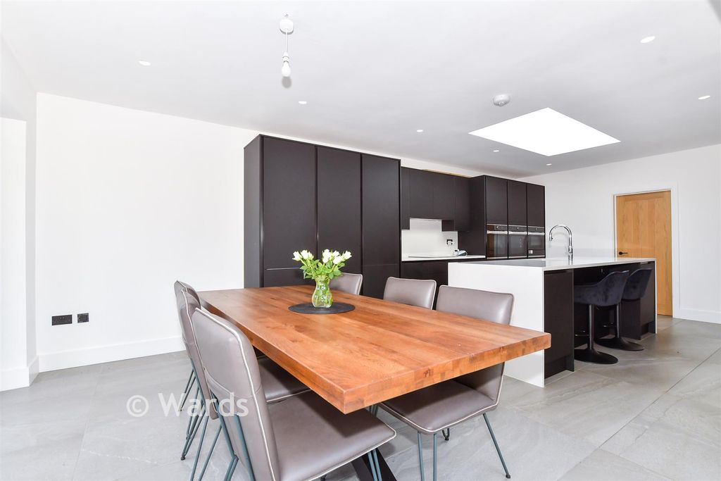 Property photo 3 of 15 Kitchen/Dining/Family Room