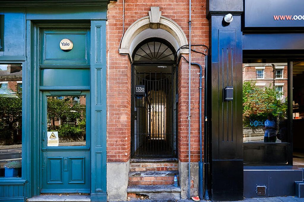 Property photo 2 of 5 Charming Entrance Showcasing A Blend Of Classic Ar...
