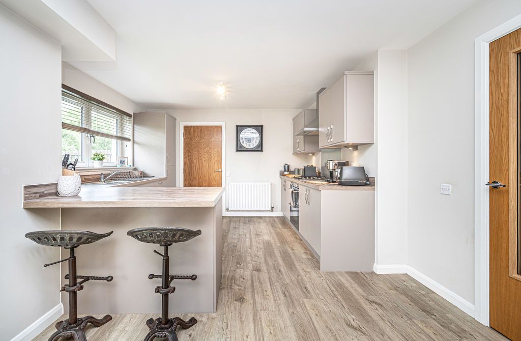 Property photo 2 of 28 Dining Kitchen