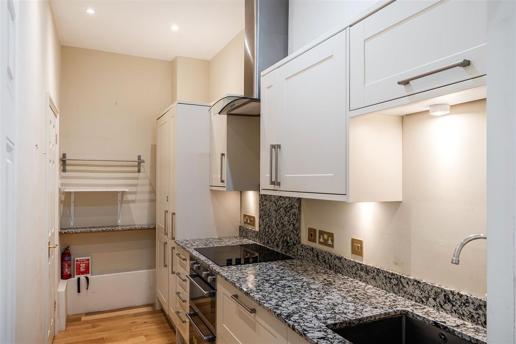 Property photo 3 of 12 Kitchen.Jpg