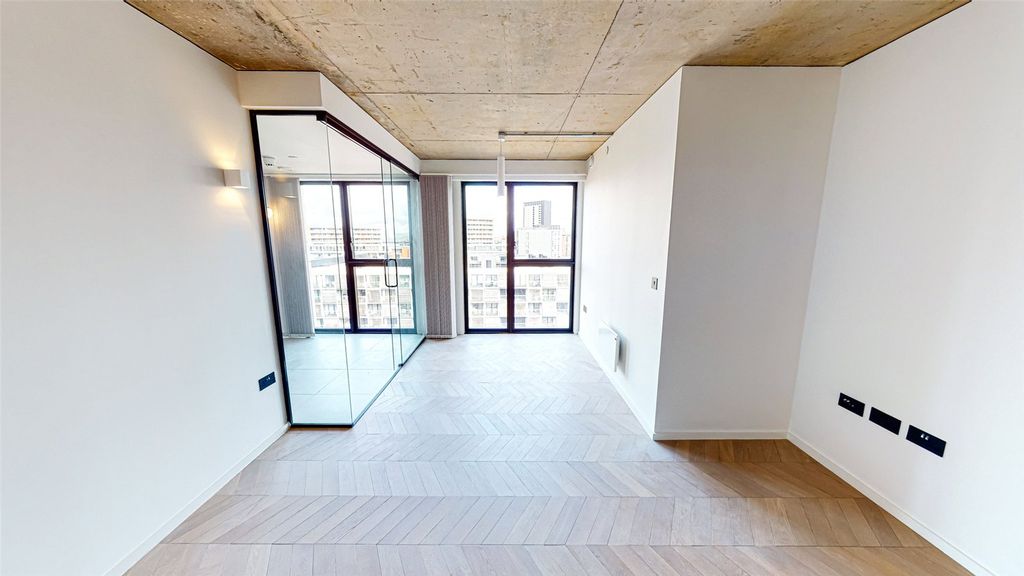 Property photo 3 of 17 Living Area