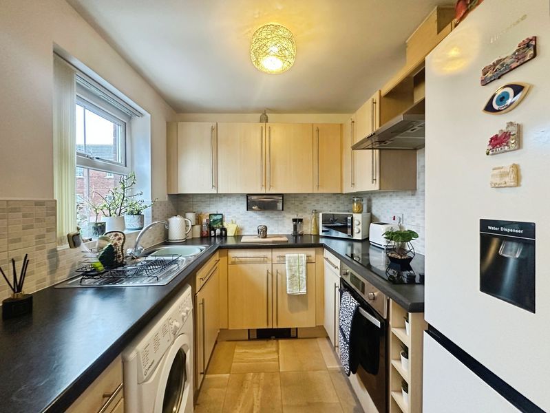 Property photo 3 of 7 Kitchen