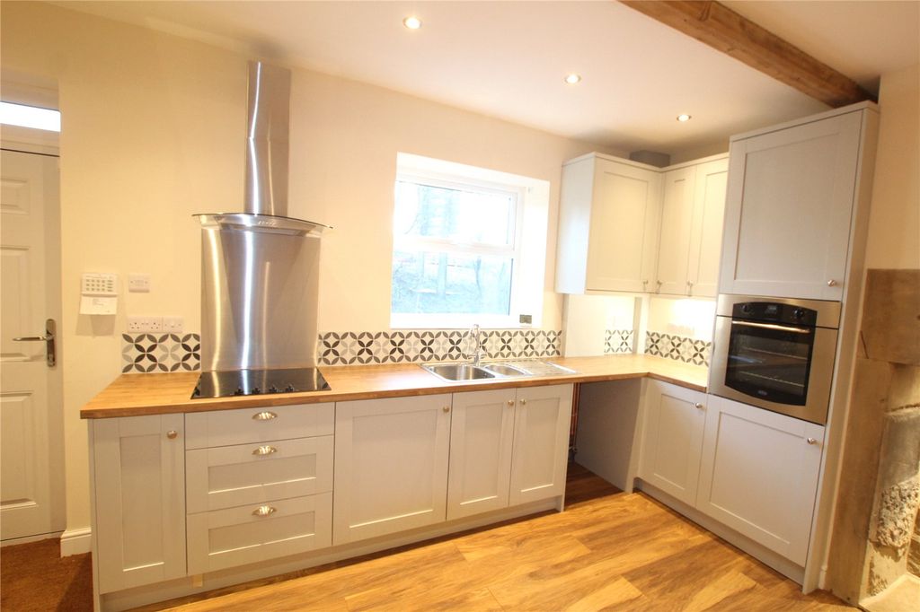 Property photo 3 of 10 Kitchen Area