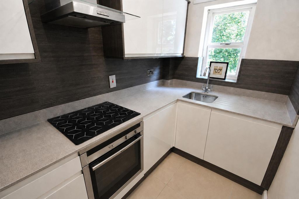 Property photo 3 of 13 Kitchen