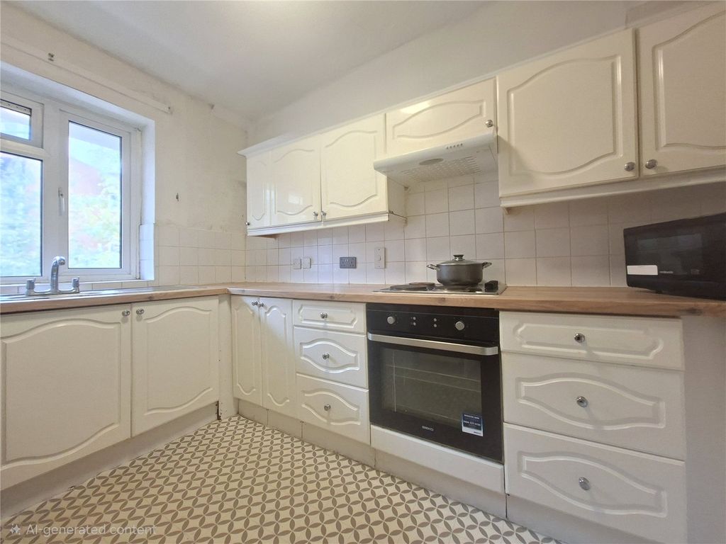 Property photo 2 of 9 Kitchen