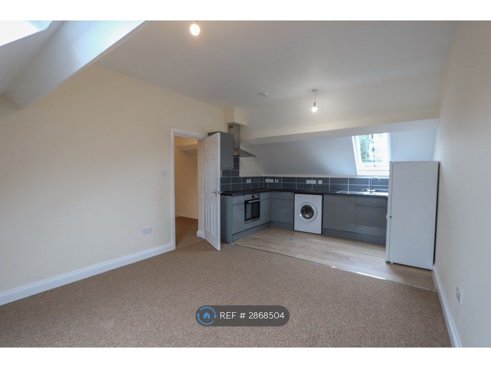 Property photo 2 of 12 Kitchen / Living Area