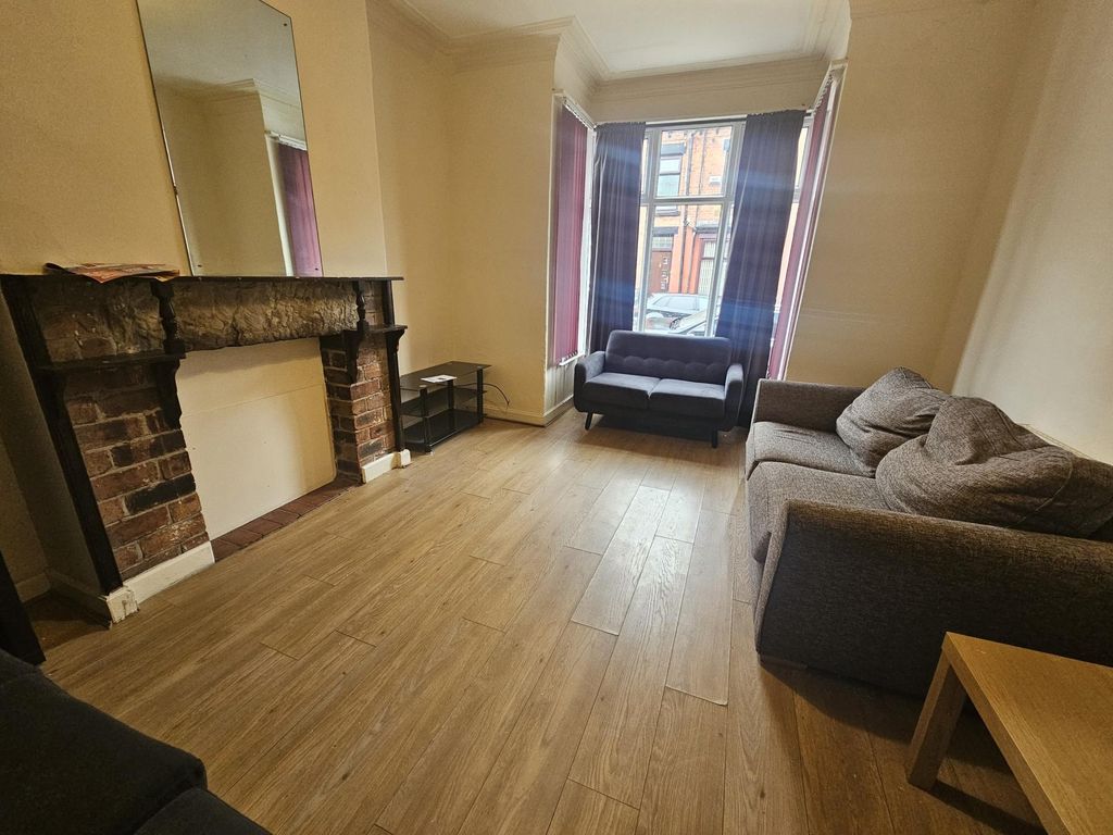 Property photo 1 of 10 Bright And Welcoming Living Room With Large Window...