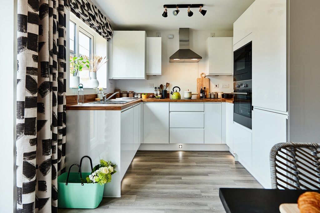 Property photo 3 of 12 A Bright And Airy Kitchen Is The Perfect Place To Cook And Entertain