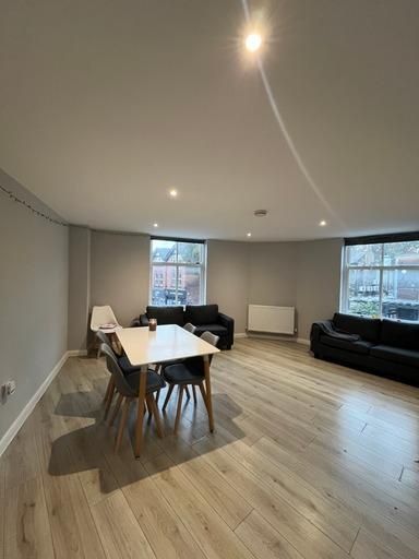 Property photo 3 of 21 Spacious And Modern Living Area With Ample Natural...