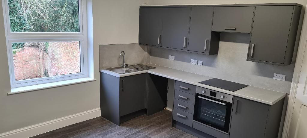 Property photo 3 of 8 Kitchen